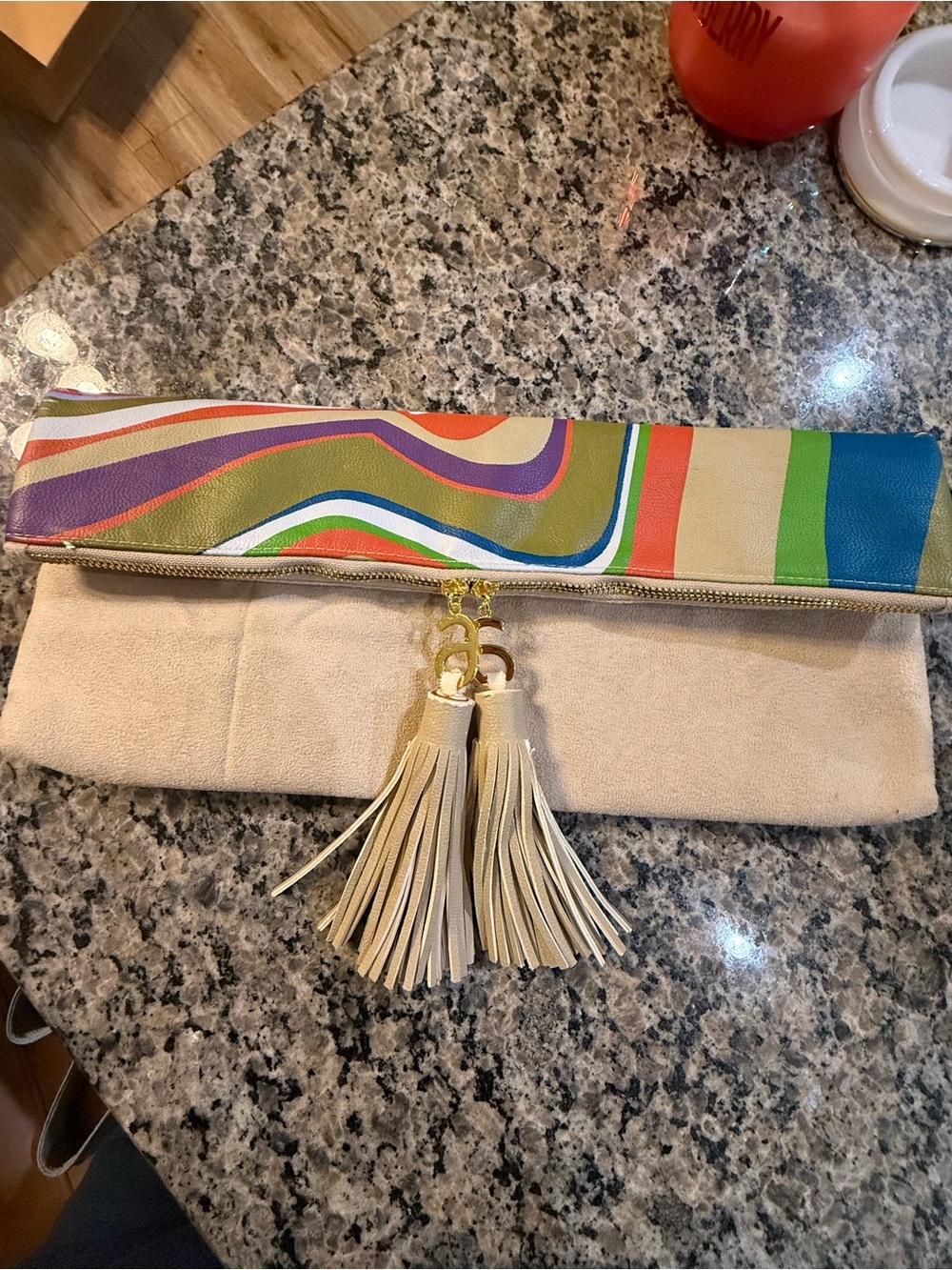 Arbonne Cream Fold-Over Clutch with Multicolor Stripe Accent